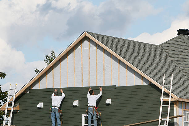 Professional Emergency Siding Repair technician working in Ellenwood, GA
